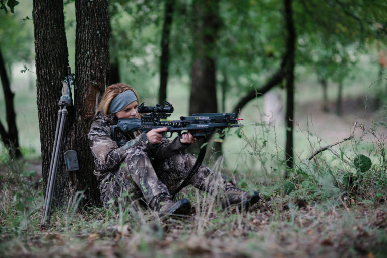 Kendall Jones taking a shot in the field